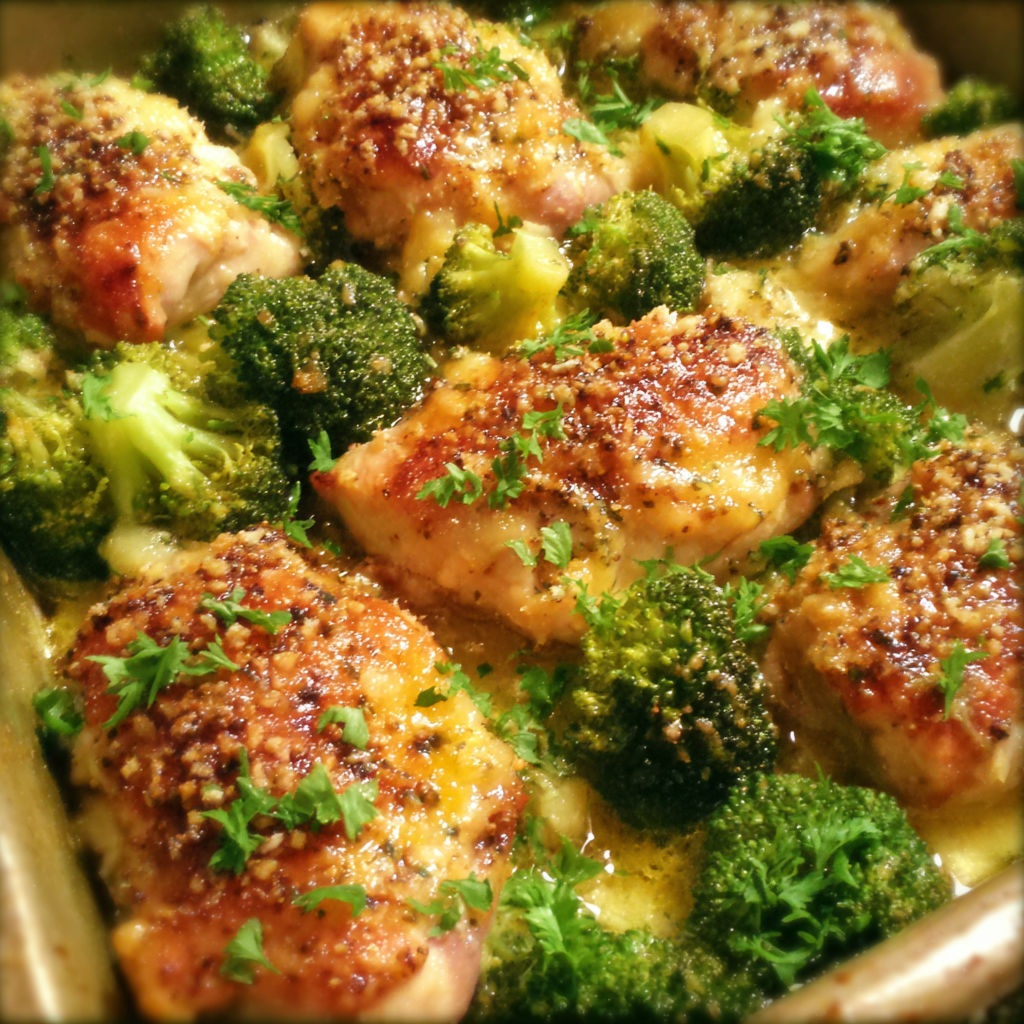 Chicken with broccoli in a pan.