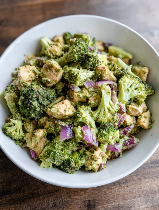 A bowl of broccoli and chicken.