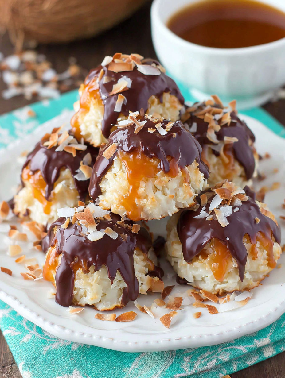 A plate of chocolate covered coconut balls.