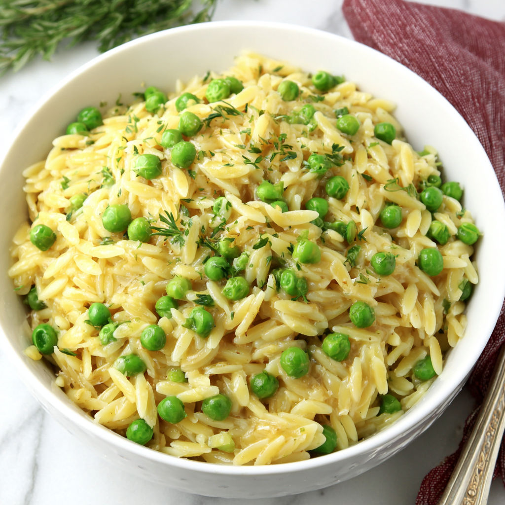 A bowl of rice, peas and Parmesan cheese.