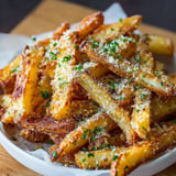 A plate of crispy baked parmesan garlic fries.