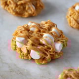 A close up of a cookie with marshmallows and peanut butter.