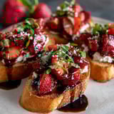 Strawberry Balsamic Crostini on a plate.