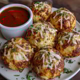 A plate of cheesy garlic pizza balls.