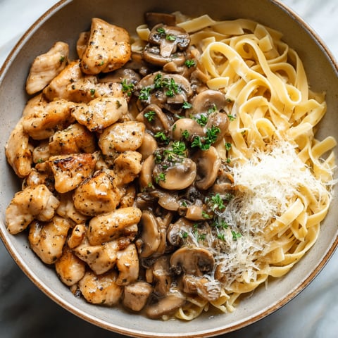 A bowl of chicken marsala pasta.