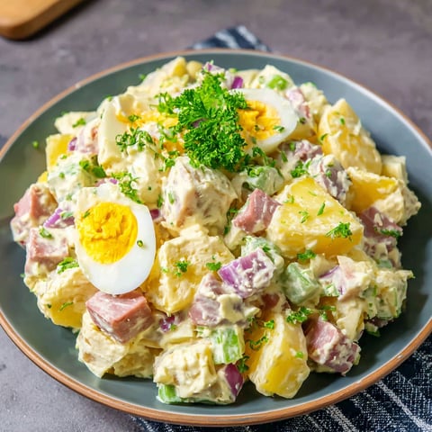 A plate of food with eggs and potatoes.