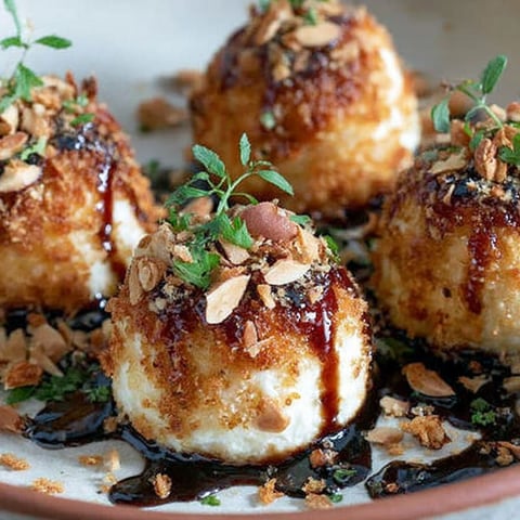 Parmesan creme balls with white balsamico.