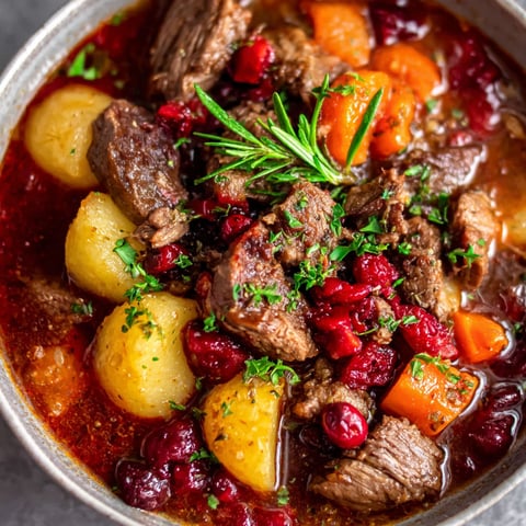 A bowl of meat and vegetables.
