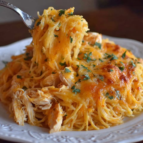 A plate of cheesy chicken spaghetti.