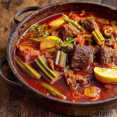 A bowl of meat and vegetables.