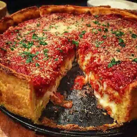 A slice of deep dish pizza.