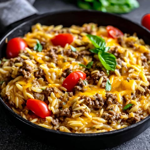 A delicious savory cheeseburger orzo skillet.