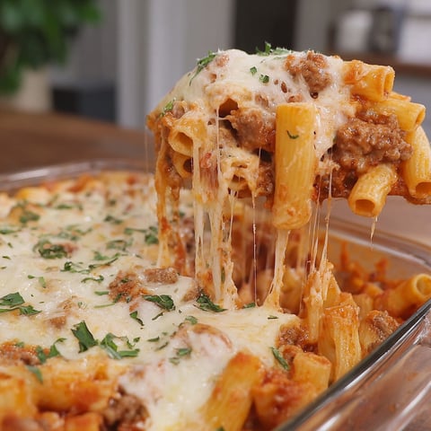 A close up of a delicious creamy baked ziti dish.